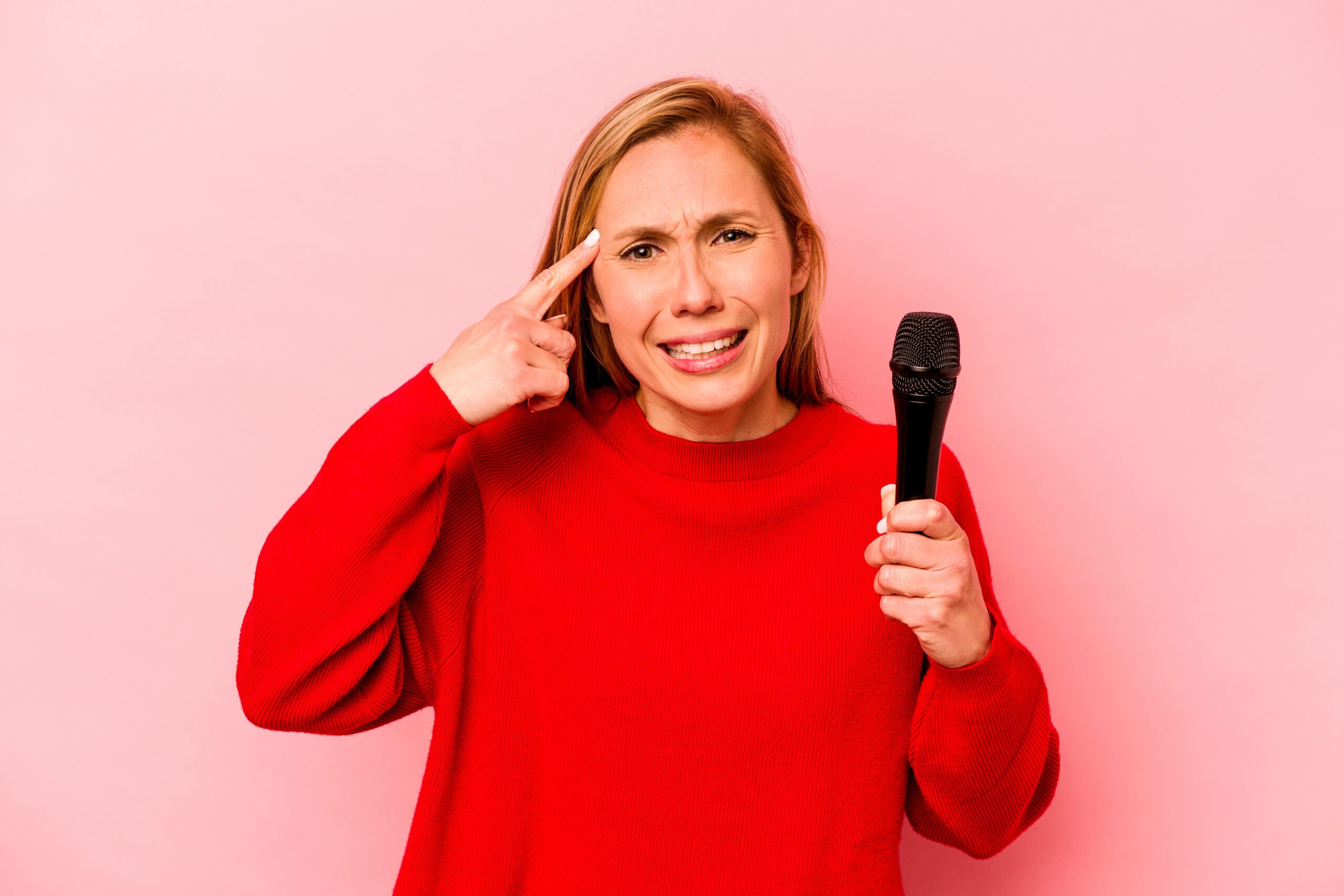 woman -disappointed-at-making-singing-mistake